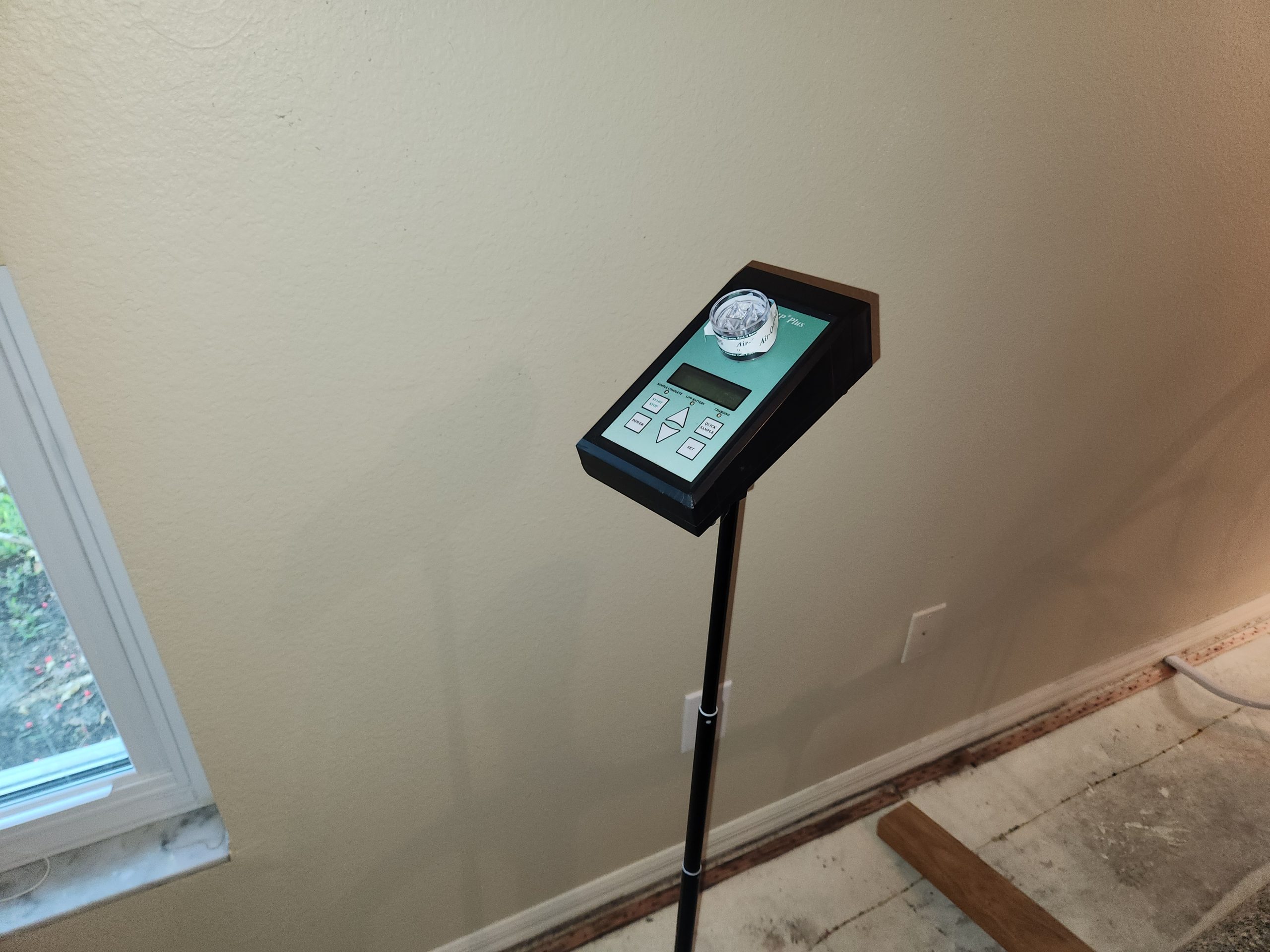 A licensed mold inspector performing a mold inspection in Clearwater FL